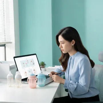 Retail content strategist reviewing baby care product page layouts