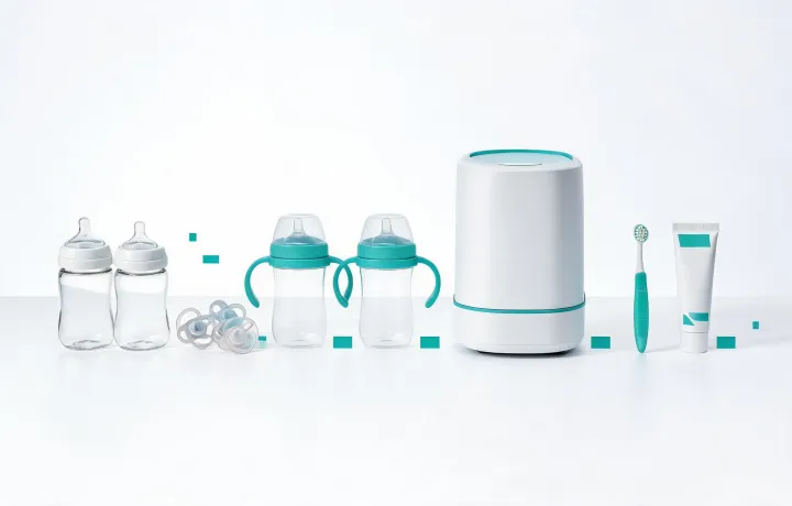 Baby bottles, pacifiers, sippy cups, and bottle care items arranged by category